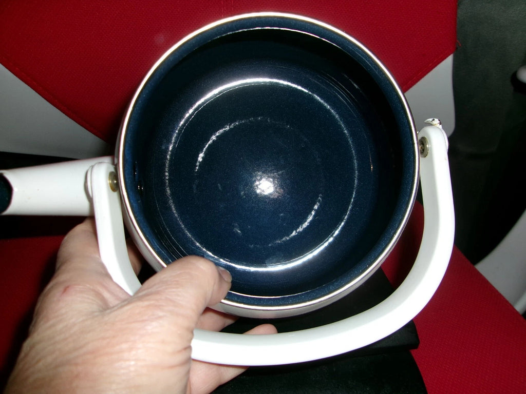 tea kettle white and blue flowers on it made in thailand